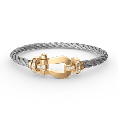 [GALE]FORCE LARGE HORSESHOE HALF DIAMOND BRACELET GOLD